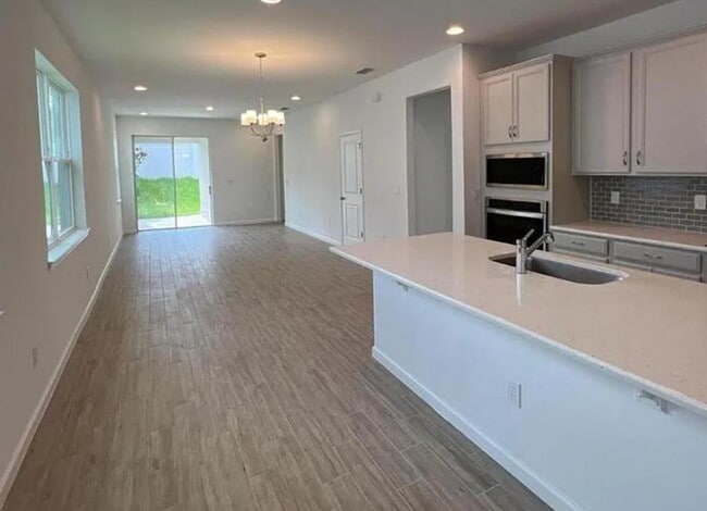 Building Photo - Spacious & Modern 4-Bed Home in Hartwood Landing – Minutes from Orlando!