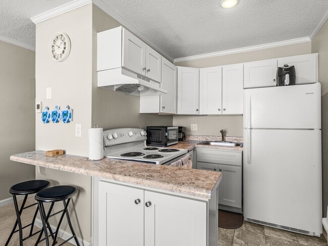 Foto del edificio - Furnished avail @ Topsail Reef Condos - OCEANFRONT