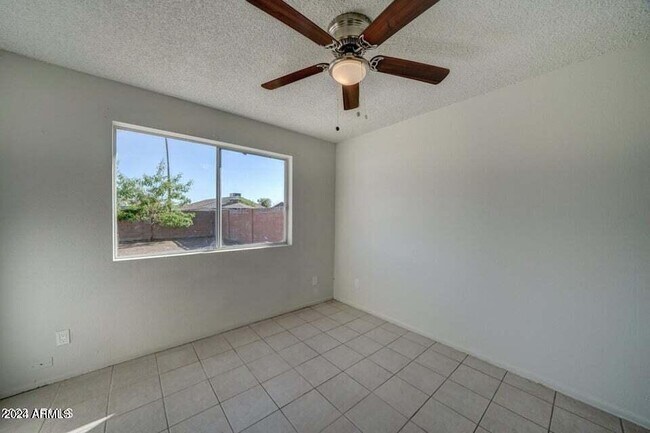 Building Photo - 5609 W Encanto Blvd