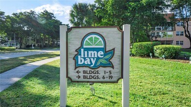 Building Photo - 9091 Lime Bay Blvd