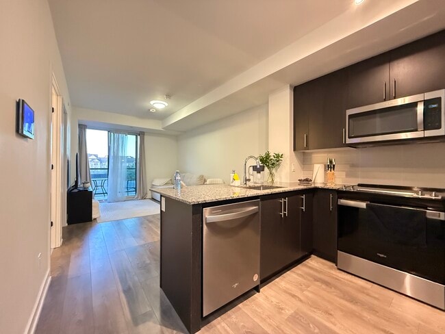 Building Photo - 215-335 Wheat Boom Dr Oakville Ontario L6H 7Y1
