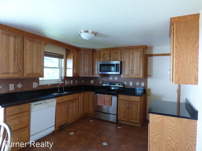 Building Photo - 4 br, 1.5 bath House - 1200 S. Pratt Pkwy