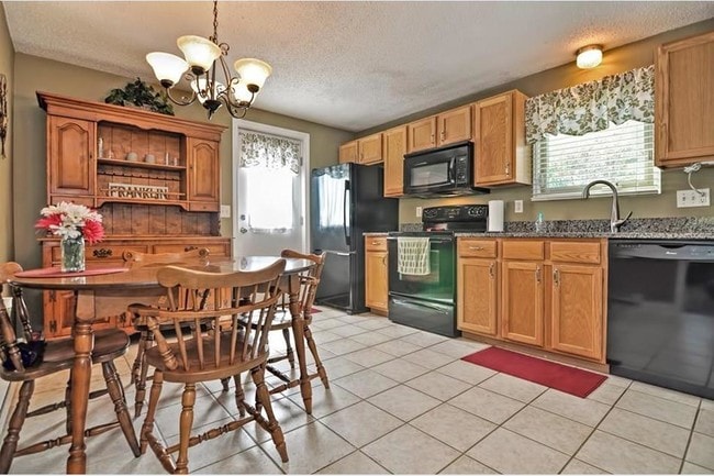 New flooring has been installed - see photos at end of listing - 98 Hayward St