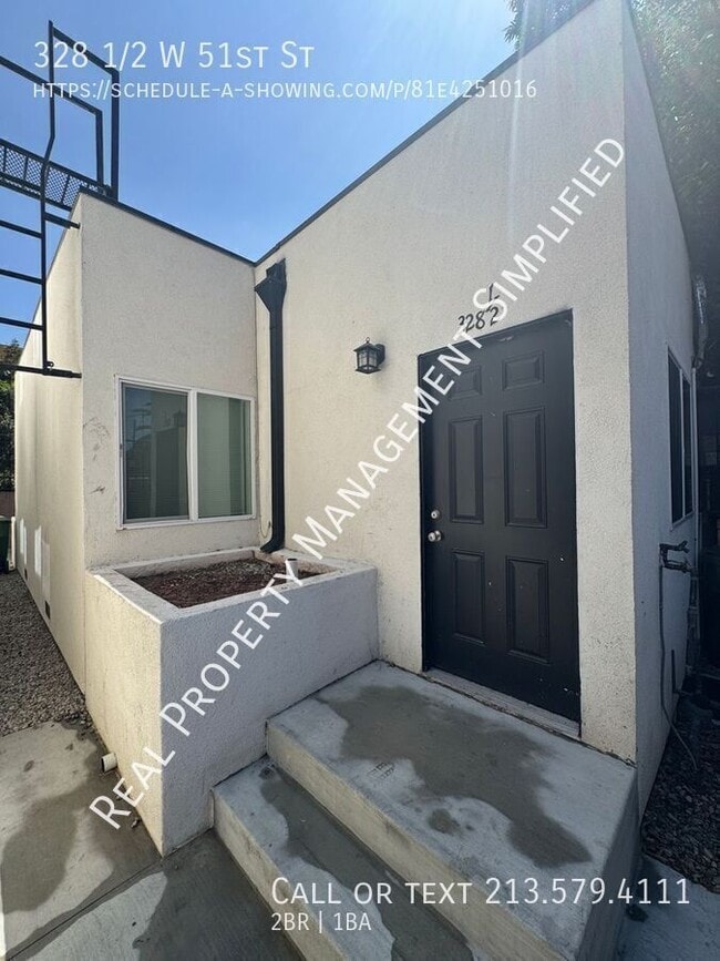 Building Photo - 328 1/2 W 51st St-