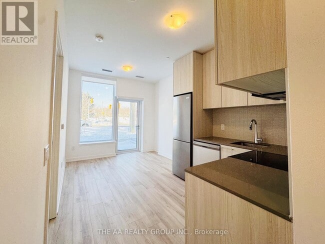 Building Photo - 7437 Kingston Rd