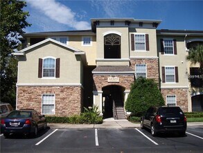 Building Photo - 10205 Courtney Palms Blvd