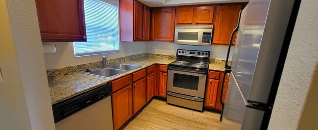 Building Photo - VERY NICE & AFFORDABLE 2 BED / 2 BATH CONDO – W/D, PATIO, POOL!