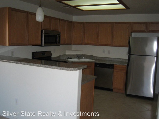 Building Photo - 9580 W Reno Ave