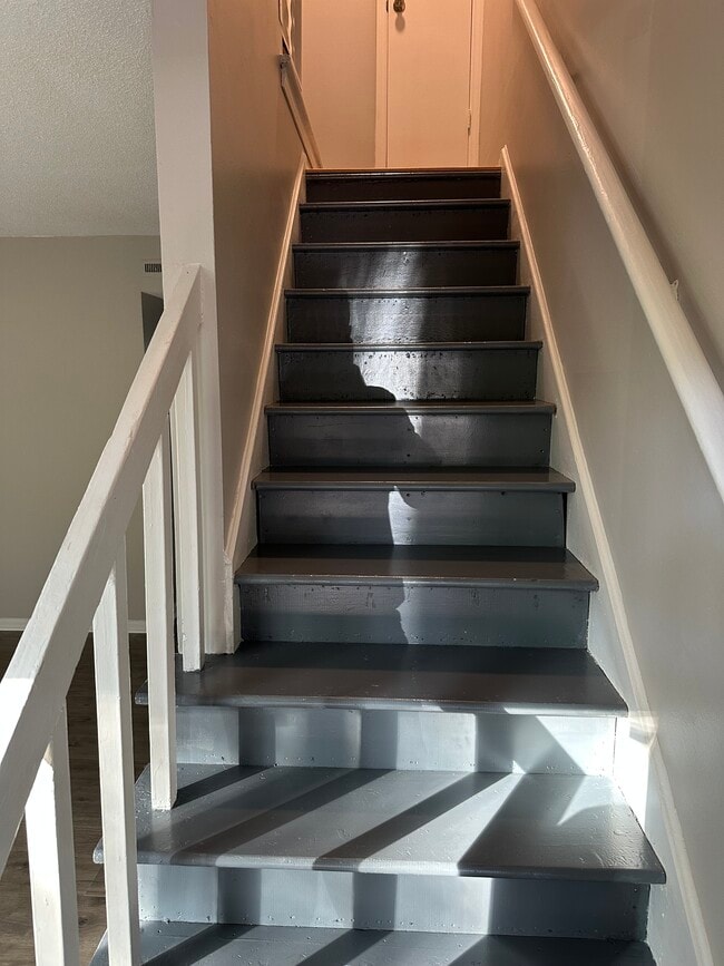 Entryway leading upstairs to bedrooms - 815 Raleigh St