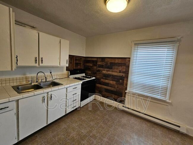 Foto del edificio - 1423 W Maxwell Ave