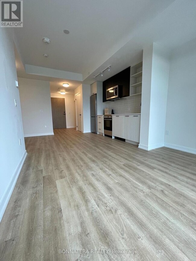 Building Photo - 2306-2306 St Clair Ave W