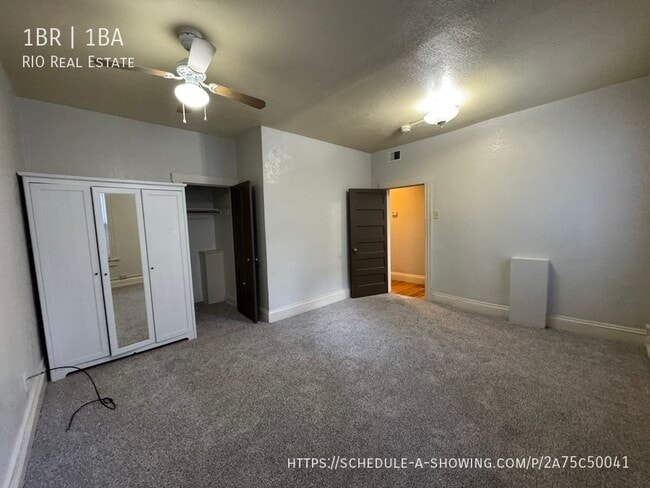 Building Photo - Spacious Top Floor Corner Unit in Uptown!