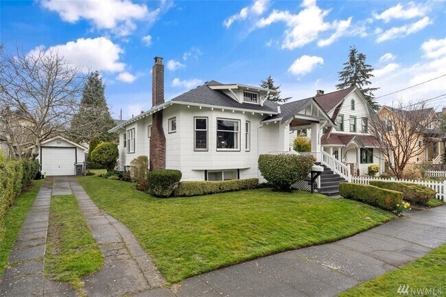 Front house showing driveway and garage - 3036 NW 65th St