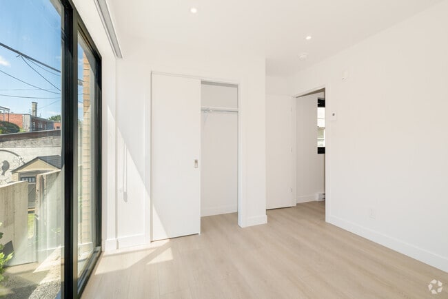 3BR, 2BA - 1200SF - Primary Bedroom - Le Cent Dix