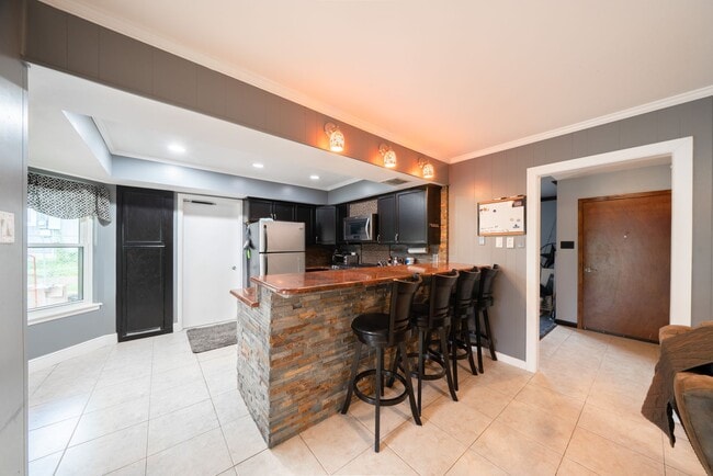 Building Photo - Updated 3-Bedroom Home with Private Yard &...