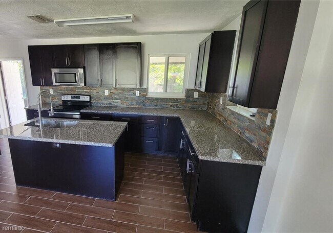Building Photo - 3 br, 2 bath House - 322 N 68th Way