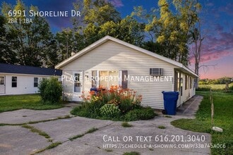 Building Photo - 6991 Shoreline Dr