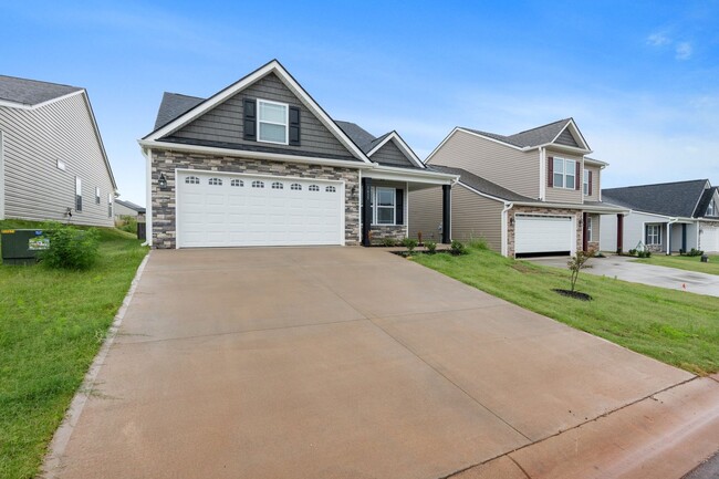Building Photo - Lovely 3 BR, 2.5 BR Home with 2 Car Garage...