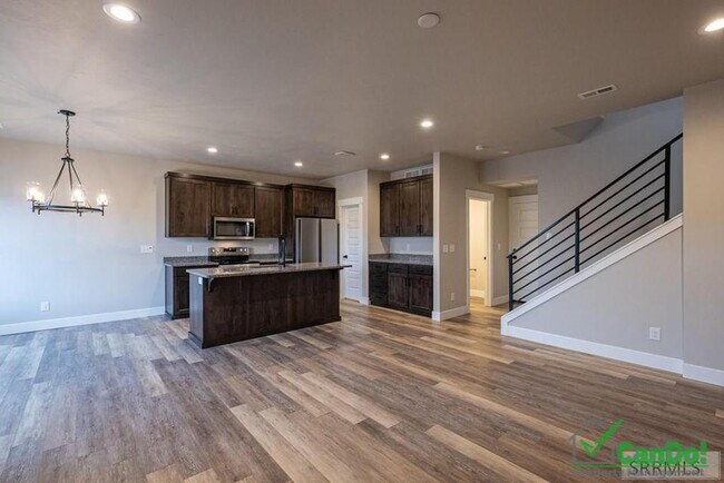 Building Photo - BEAUTIFUL 4 BEDROOM TOWNHOME for rent in Ammon w/ 2 Car Garage! Deposit Free Lease option for qua...