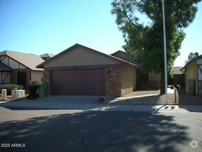 Building Photo - 6547 W Poinsettia Dr