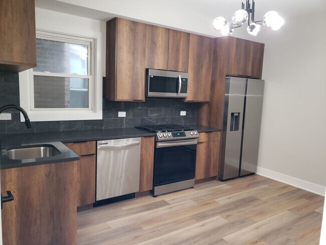 Foto del edificio - 3035 N Kilpatrick Ave