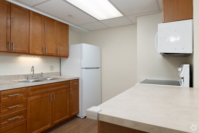 1BR, 1BA - 750SF - Kitchen - Highland West Senior Citizens Apartments