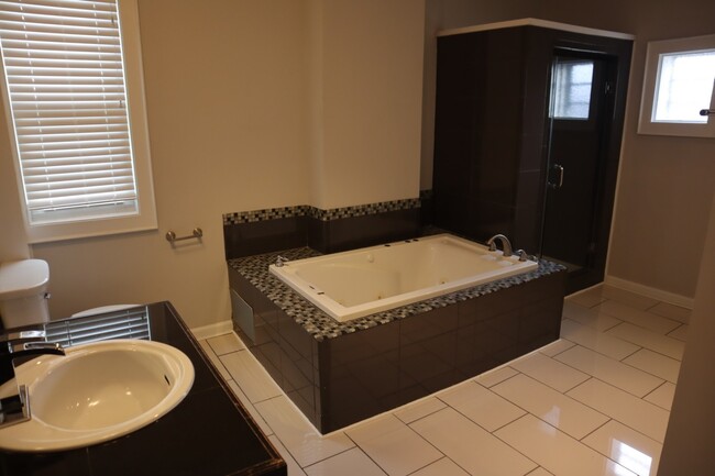 Main Bathroom with jacuzzi tub and stand in shower - 1203 Fair Ave