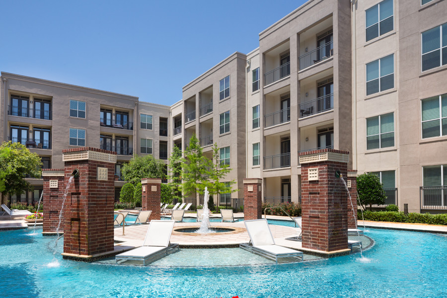 Resort-style swimming pool with tanning areas - ICON at Ross