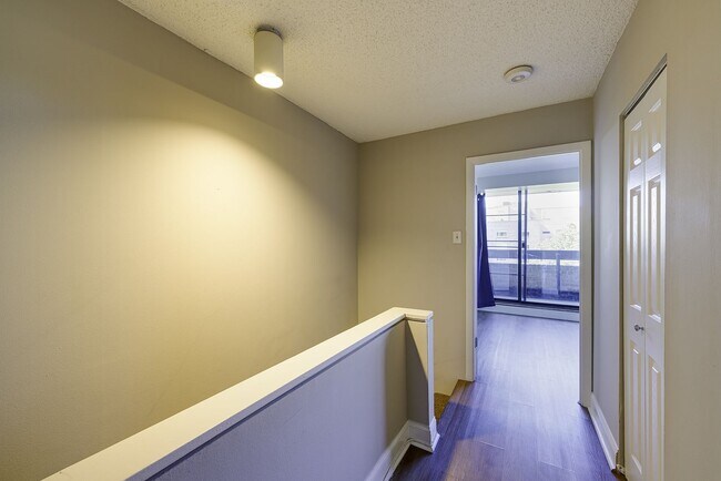 Building Photo - Two-level 2BR/2BA Condo with Balcony and Garage Parking