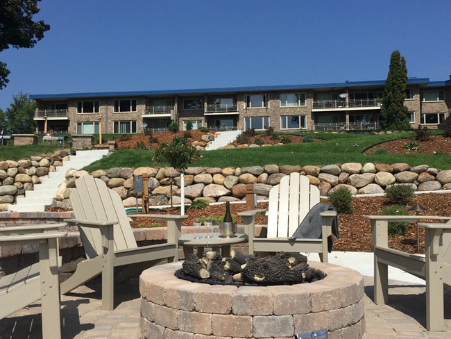 Relax by the lakeside outdoor firepit - Minnetonka Edgewater Apartments and Boat Slips