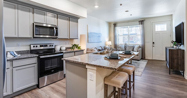 Building Photo - The Meadows at Tutt Village Townhomes