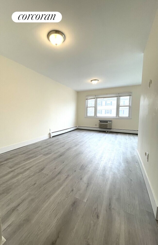 Building Photo - 15-35-35 209th St