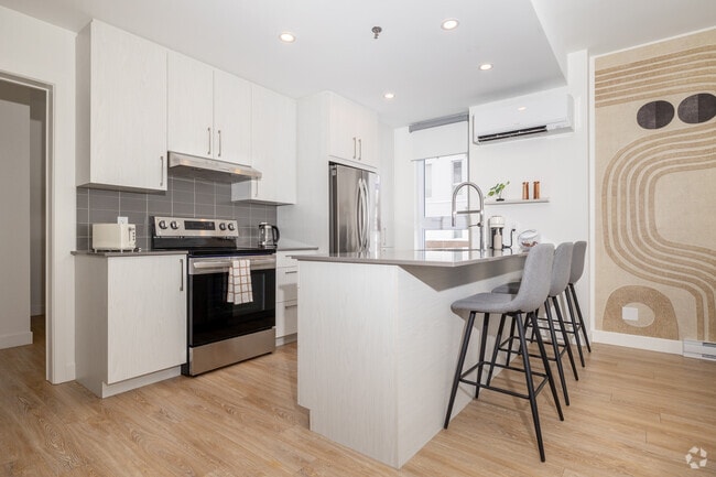 2 chambres, 2 salles de bain - 107 m² - Cuisine - Loggia Saint-Lambert