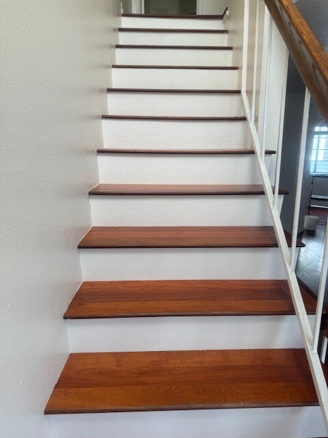 stairs to upstairs bedrooms/bathrooms - 109 W Spring St