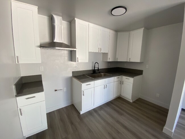 Foto del edificio - 1209 W 39th Pl