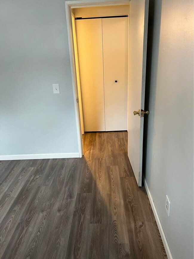 Bedroom with view of linen closet - 163 E Bridge St