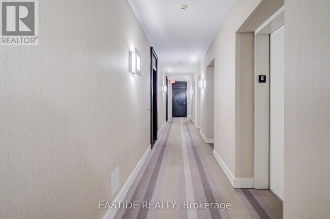 Building Photo - 33 Charles St E