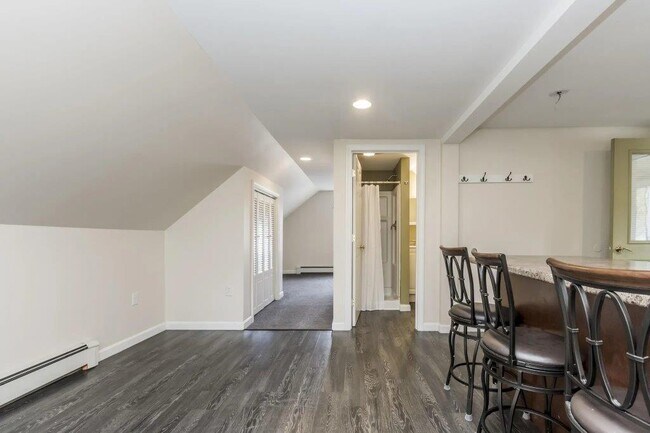 Looking across living area to bedroom - 24 Village St
