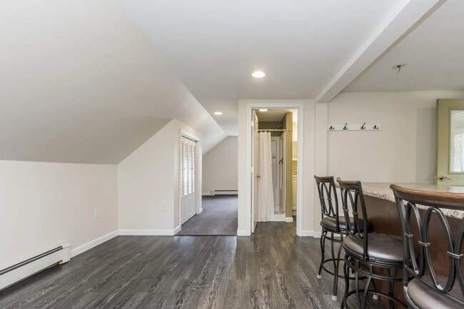 Looking across living area to bedroom - 24 Village St