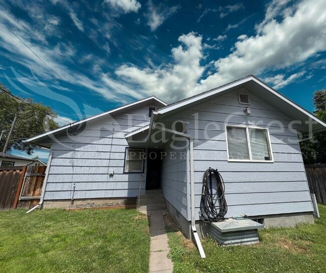 Building Photo - Three Bedroom, Two Bathroom House with Fenced Yard and Outdoor Fireplace