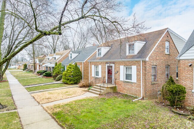 Beautiful brick, Cape Cod style homes line the quiet streets in Calumet Park.