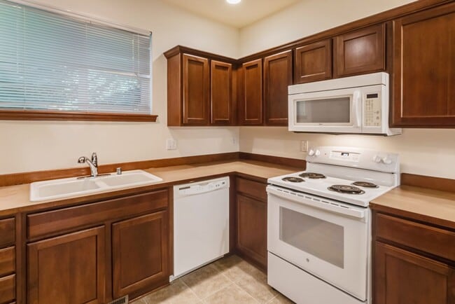 Building Photo - 3 Bedroom, 2.5 Bath with a 2-Car Garage in...