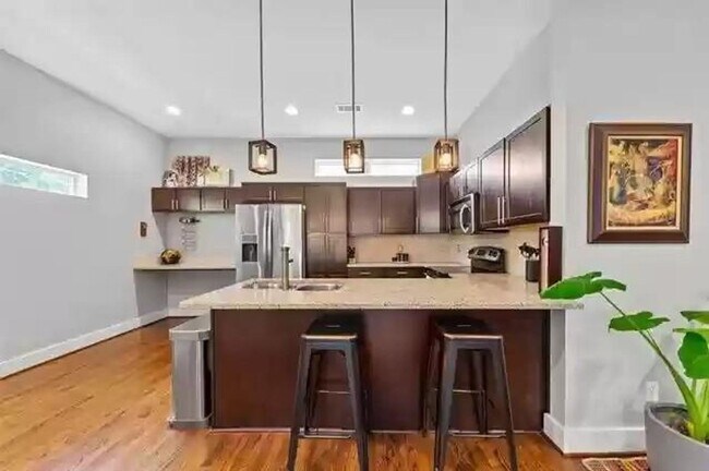 Building Photo - Beautiful Three-Story Corner Condo availab...
