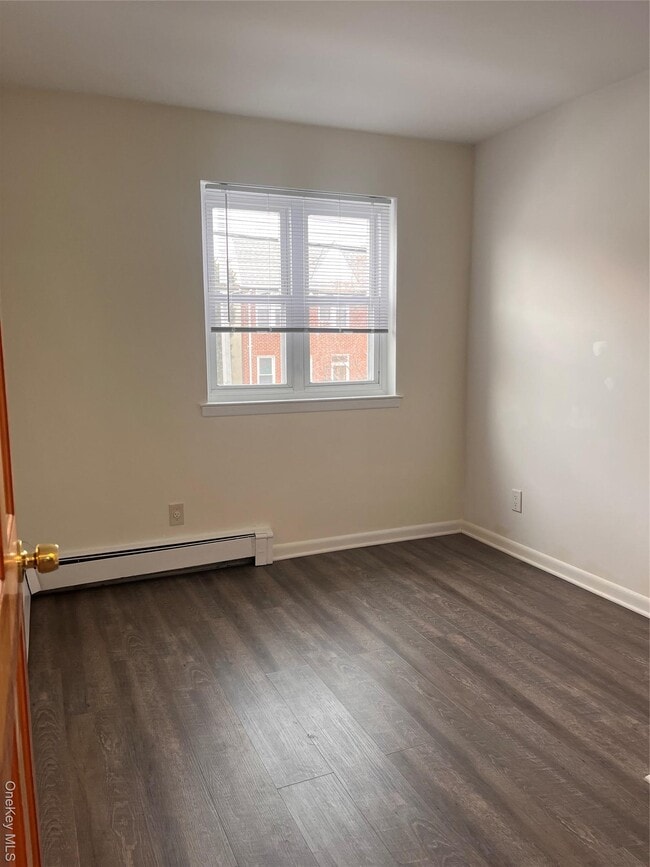 Building Photo - 25-59-59 46th St