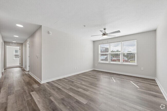 3BR, 2BA - 1,297SF - Living Room - The Meadows