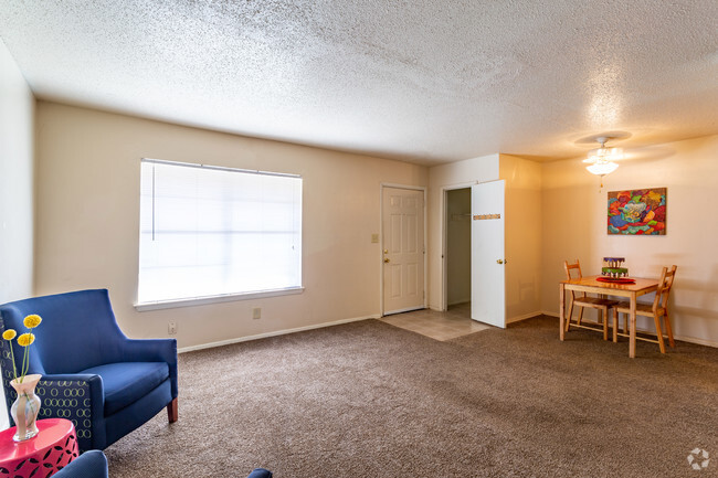 2BR / 1BA - 850 SF: Living and Dining - South Glen Apartments