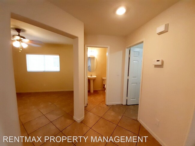 Building Photo - 4 br, 3 bath House - 10116 DESERT TREES ST