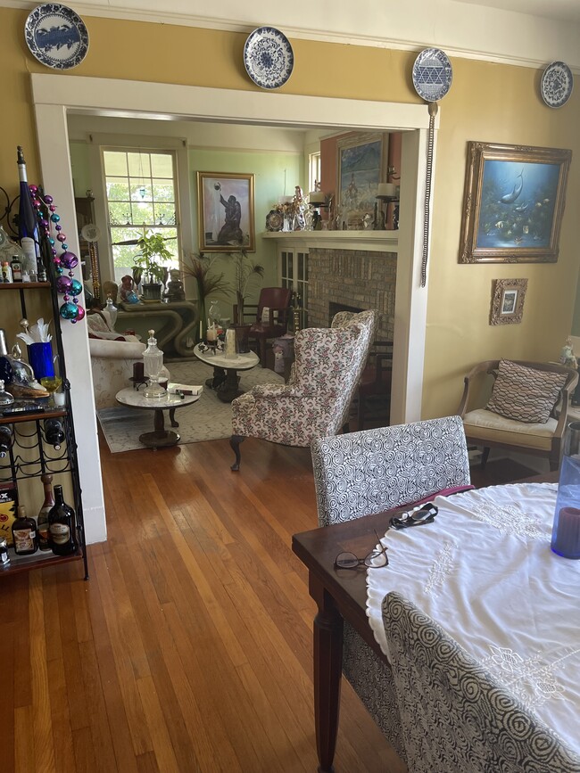 Dining Room and Living Room - 8437 S Claiborne Ave