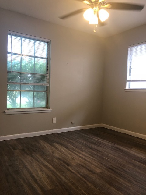 New hard flooring, new lighting, and new ceiling fans are in every room of this beautiful home. - 4802 Wycliff Dr