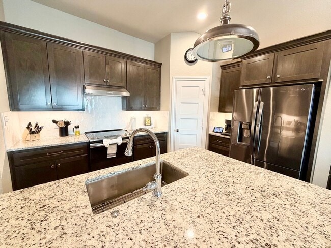 Building Photo - Beautiful 4 Bedroom Rental with Garage & Outdoor Living Space